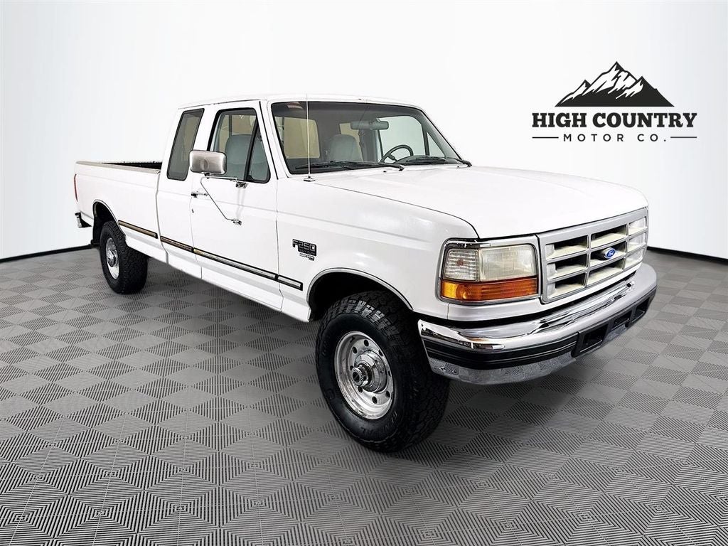 1997 Ford F-250 XLT HD in Oxford White Clearcoat — front three-quarter view