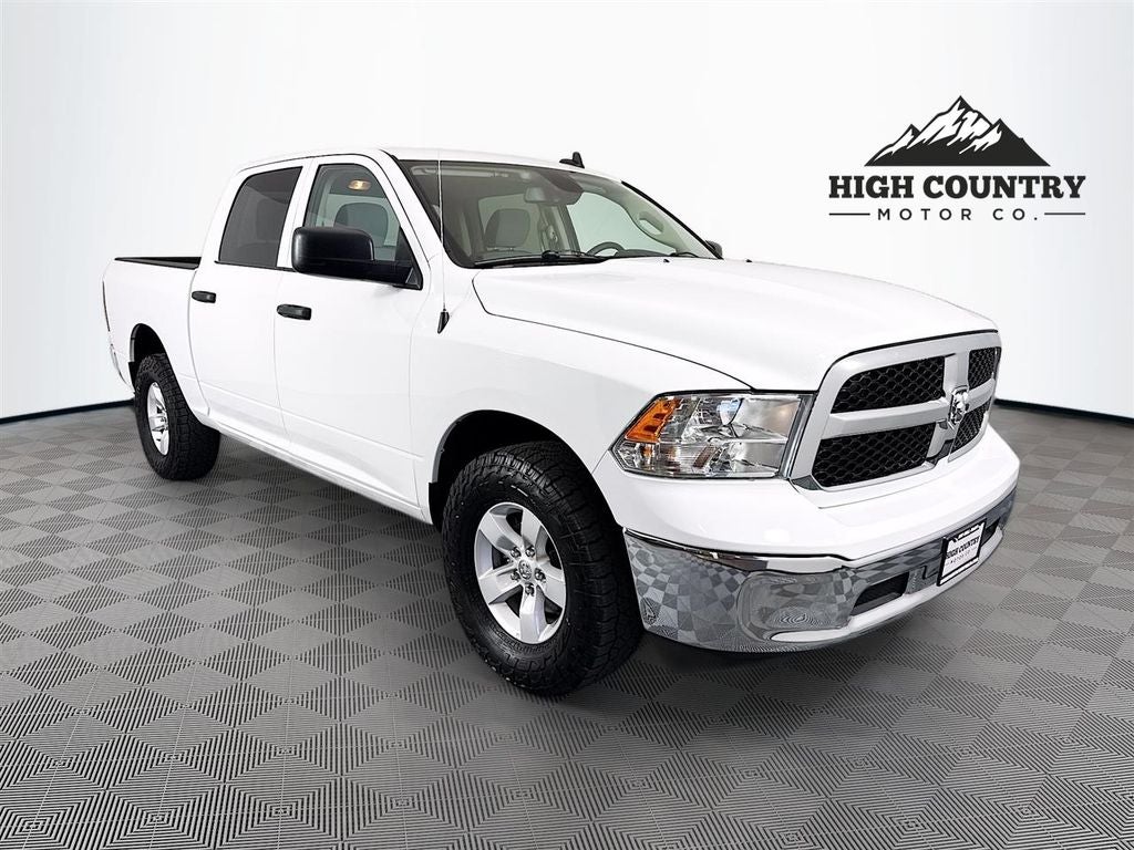 2023 RAM 1500 Classic SLT in Bright White Clearcoat — front three-quarter view