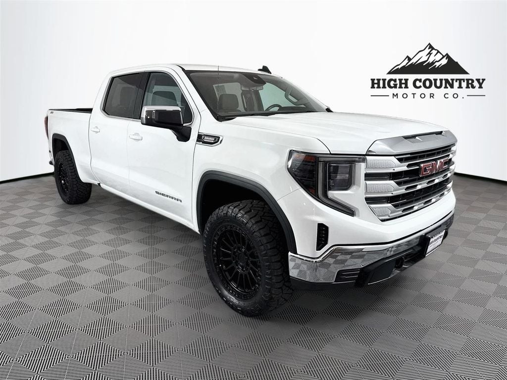 2023 GMC Sierra 1500 SLE in Summit White — front three-quarter view