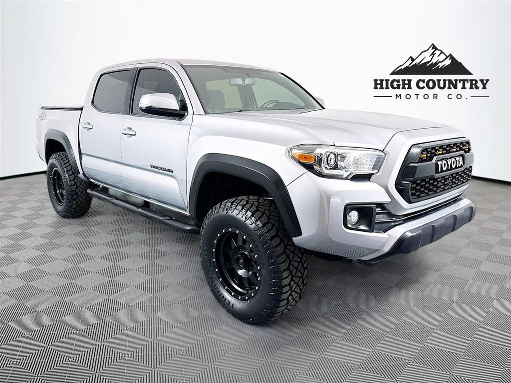 2016 Toyota Tacoma TRD Off-Road V6 in Silver Sky Metallic — front three-quarter view